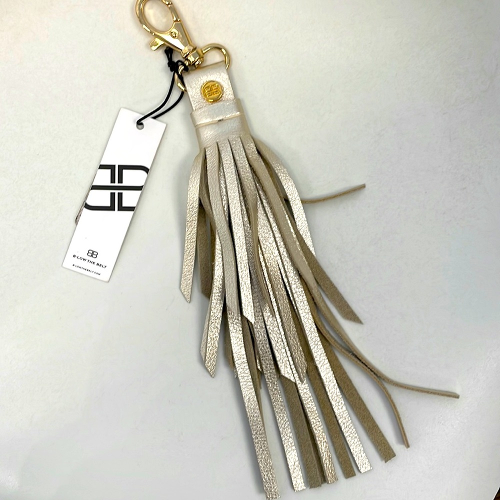 Metallic gold leather tassel bag charm
